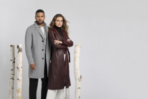 male and female models wearing autumn wool and leather outerwear