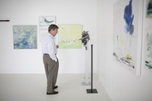 Art Buckhead attendee viewing art installation at Park Studios