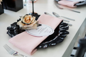 black and blush wedding place setting