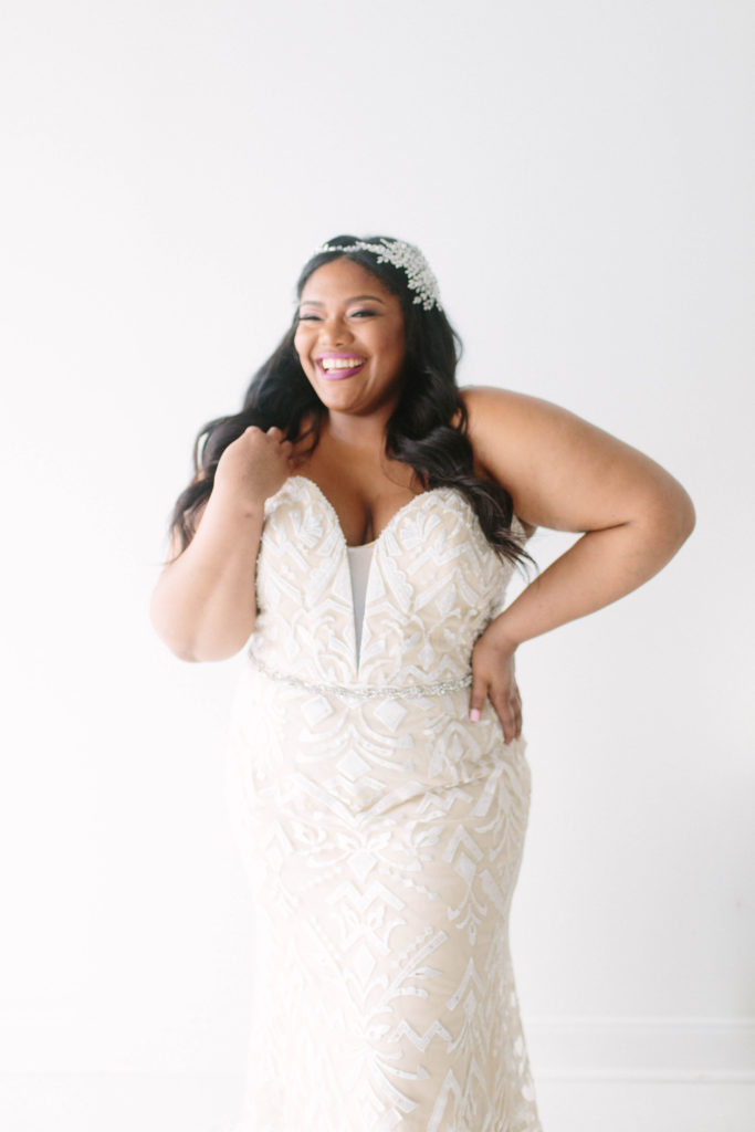 curvy black bride wearing curvy rose wedding gown