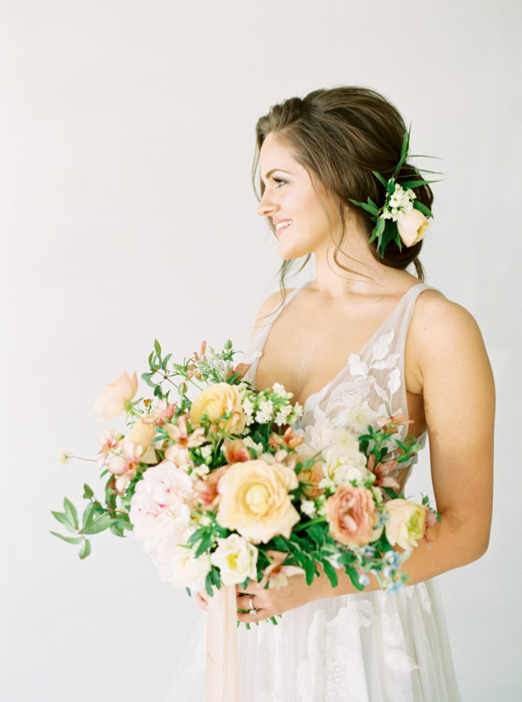 spring wedding bouquet held by bride