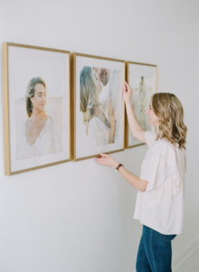 Anna Olivia Photography straightening frame installation