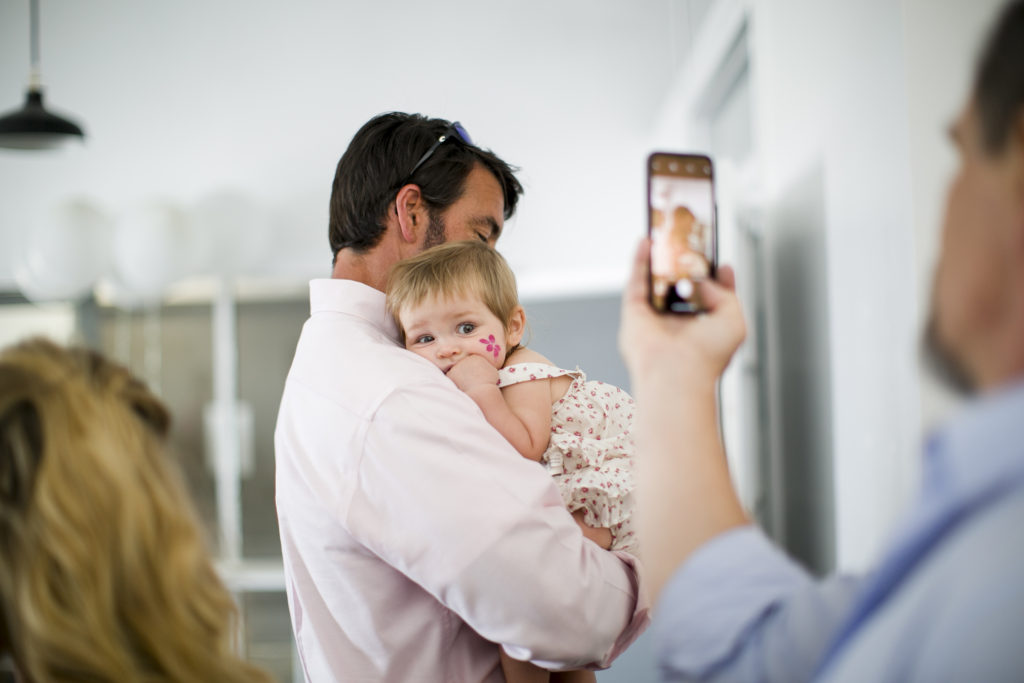 dad holding toddler daughter, Atlanta