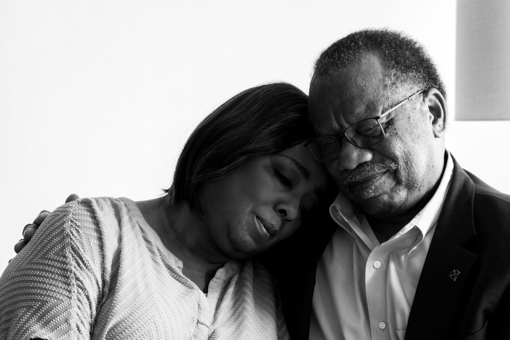 older African American couple embracing, black and white image, Park Studios, Atlanta