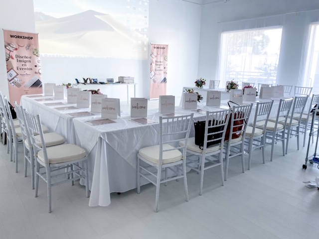 white chairs, white chair cushions, white tablecloths, Atlanta event studio, Atlanta event space, white space Atlanta, white studio Atlanta, Viviana Guerra Event Design Workshop, Viviana Guerra Event Decor Workshop