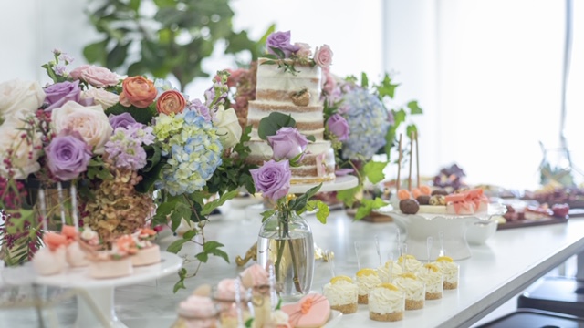 luxury floral arrangements, petit fours, cupcakes, roses, hydrangea, naked cake, cake pops, bud vase